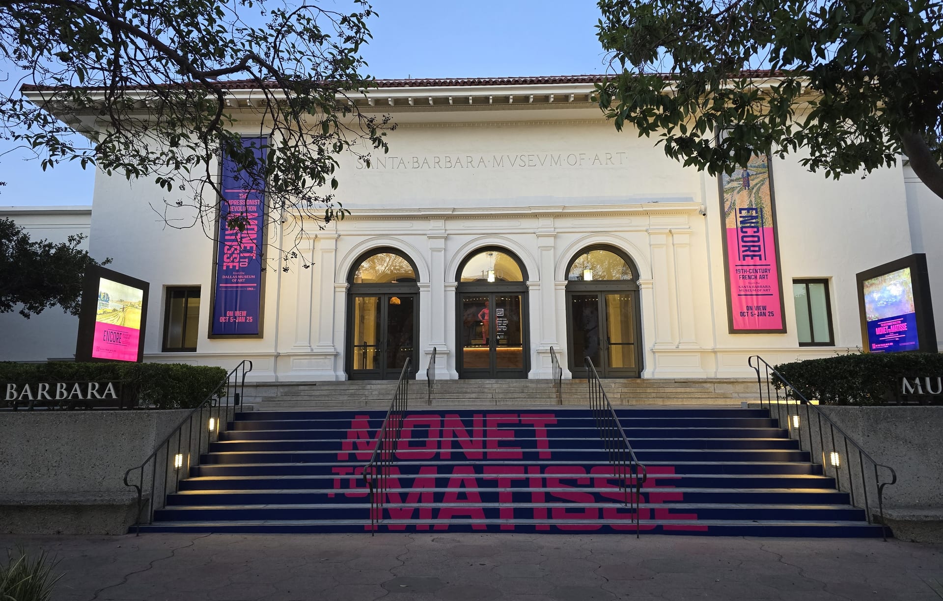 Architectural element being installed on building facade